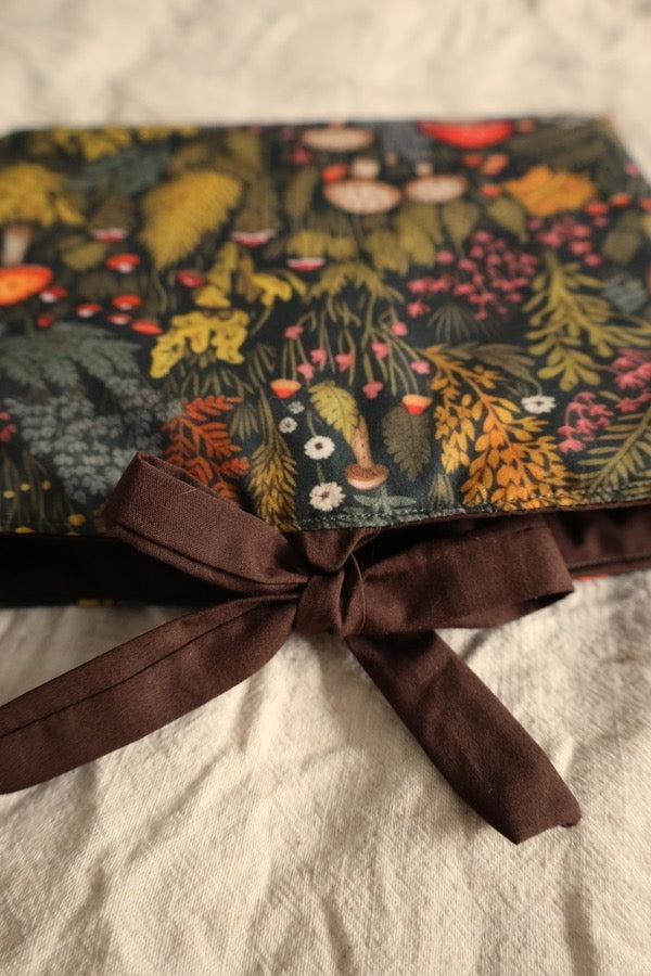 Handmade book sleeve UK forest design.