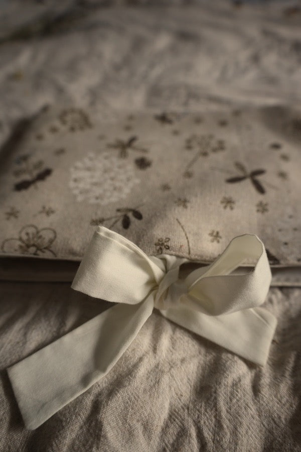 Handmade book sleeve UK floral design.