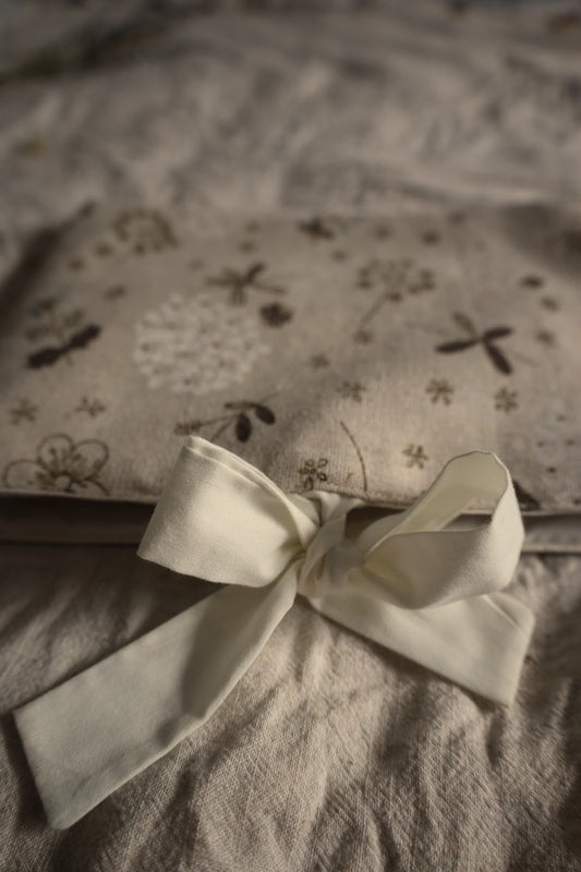 Handmade book sleeve UK floral design.