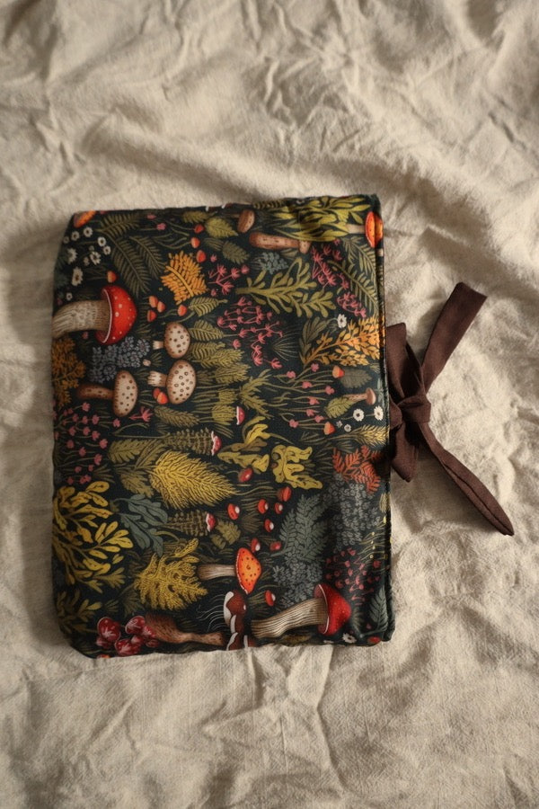 Decorative book sleeve with a bow gift.