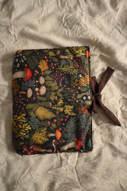 Decorative book sleeve with a bow gift.