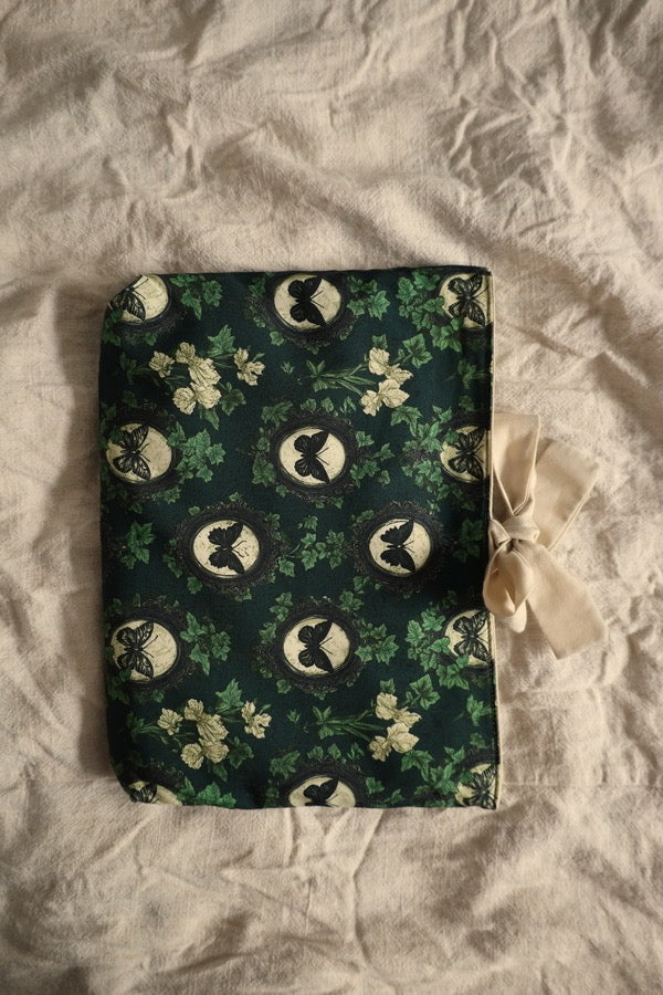 Decorative book sleeve with a bow gift.