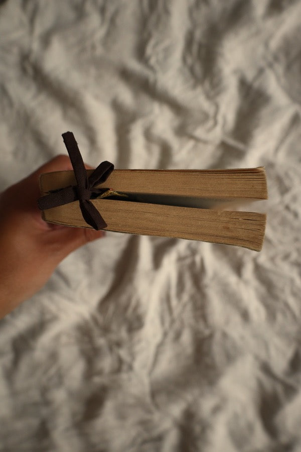 Preloved book with matching bookmark with brown bow.