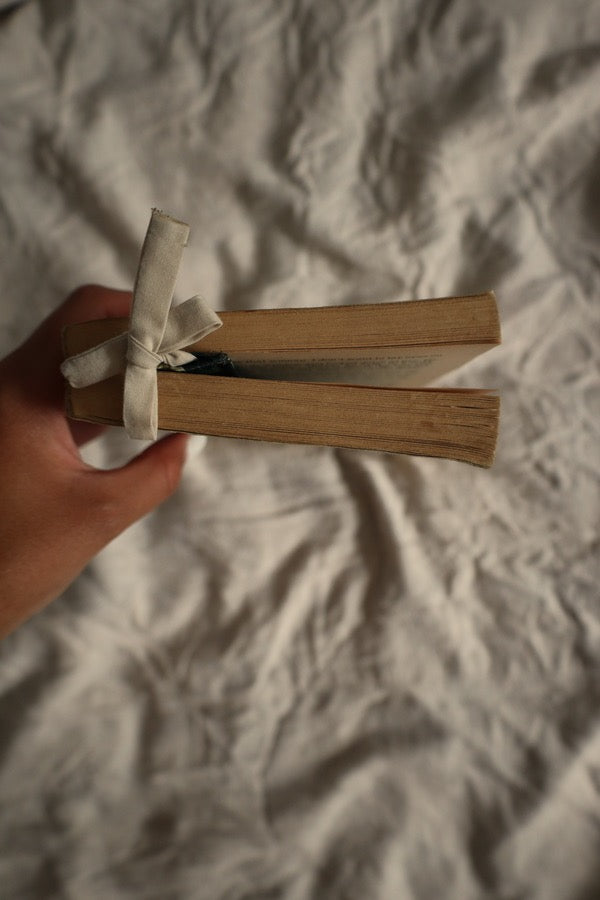 Preloved book with matching bookmark with beige bow.