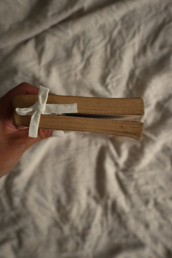 Preloved book with matching bookmark with white bow.